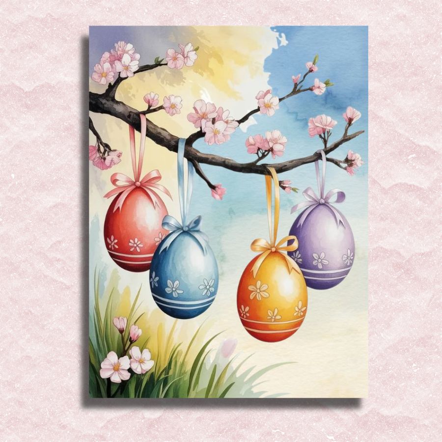 Colorful Easter eggs hanging from a cherry blossom branch with a pink floral background. Easter Ribbon Eggs - Paint by numbers