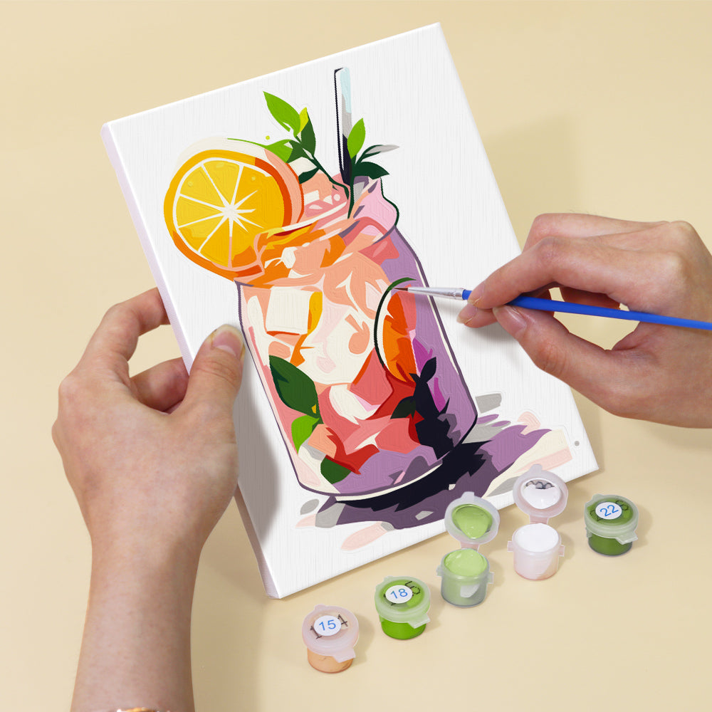 Person painting a colorful drink illustration on a canvas with paintpots. Mini Lemonade Mix 6 Pack Paint by Numbers