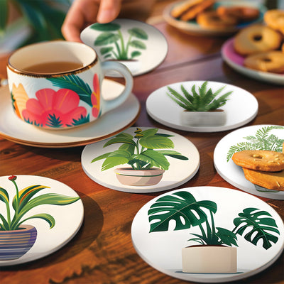 Coasters with plant designs on a wooden table with a cup of tea. Houseplants Coasters 6 Pack Paint by Numbers Lifestyle