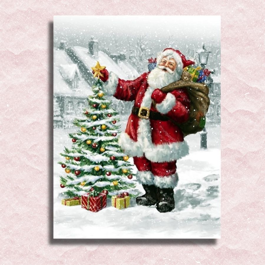 Kerstman die een ster op het canvas van de kerstboom zet - Verf op nummer