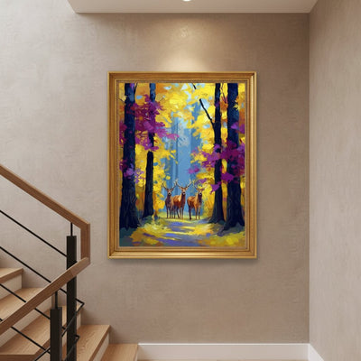 A framed vertical oil painting of a forest path with deer, hung on a beige wall above a wooden staircase. The painting features vibrant yellow and purple foliage, dark tree trunks, and a blue-lit path, enclosed in a gold frame.